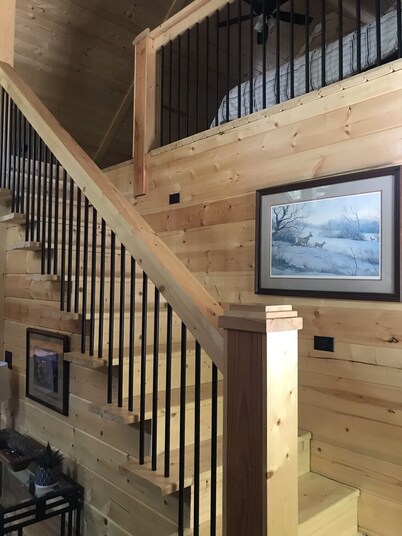 Cozy A-Frame cabin right next to the water.