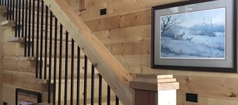 Cozy A-Frame cabin right next to the water.