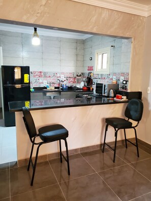 Fridge, microwave, oven, stovetop - Spacious apartment in October city close to Mall of Arabia [Families only] (Cairo Governorate)