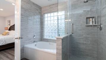 Bathtub, hair dryer, towels, soap