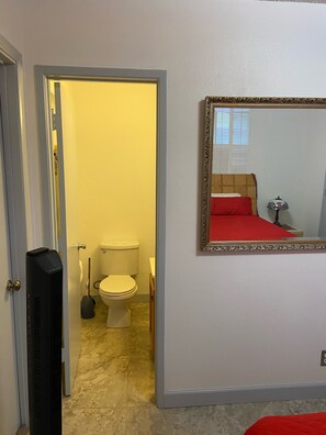 Combined shower/tub, hair dryer, towels, soap