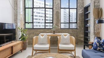 Deluxe Apartment | Living area | 40-inch Smart TV with satellite channels, TV