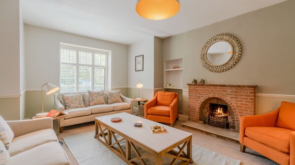 TV, fireplace, table football, books