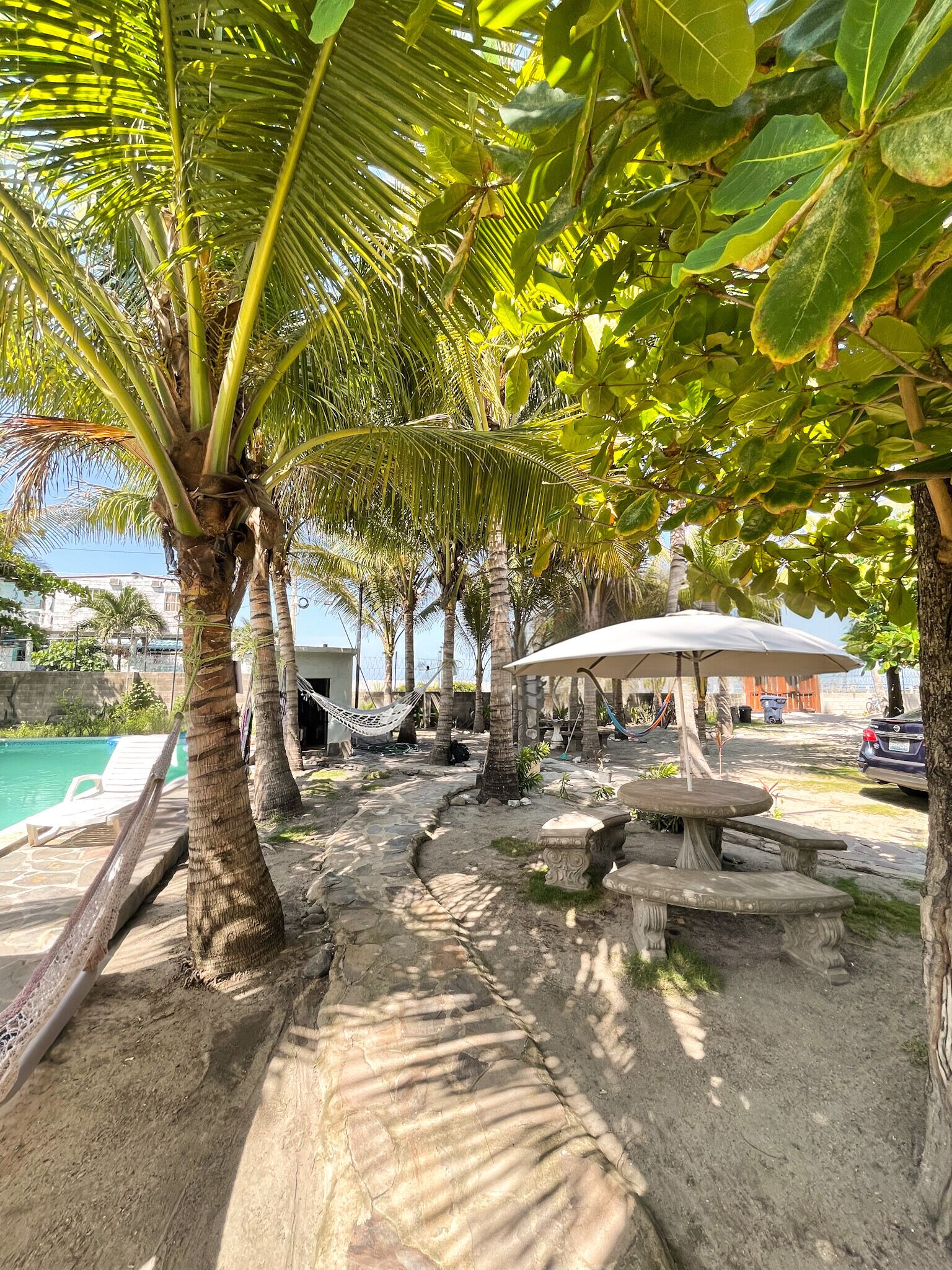 Outdoor area with shaded areas & hammocks