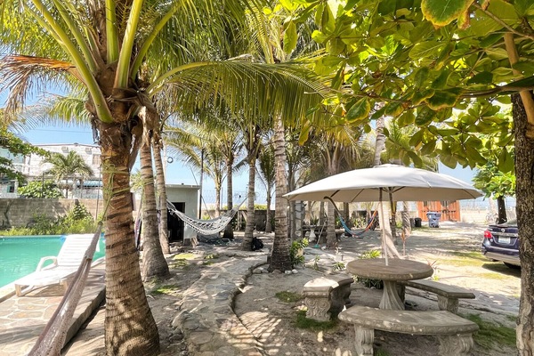Outdoor area with shaded areas & hammocks