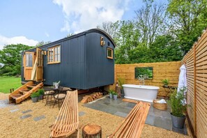Terrace/patio - Hintock, featuring an outdoor bath, in Leigh, Dorset. (Sherborne)