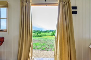 Interior - Hintock, featuring an outdoor bath, in Leigh, Dorset. (Sherborne)