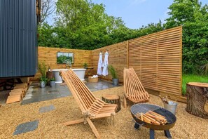 Terrace/patio - Hintock, featuring an outdoor bath, in Leigh, Dorset. (Sherborne)