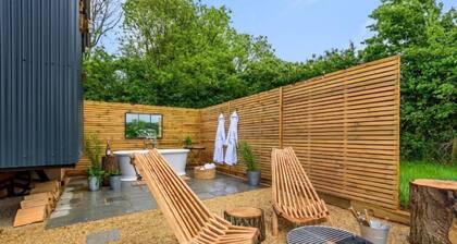 Hintock, featuring an outdoor bath, in Leigh, Dorset.