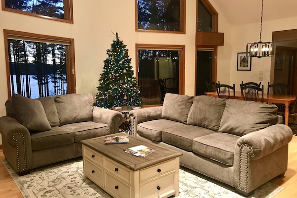 Cozy living space with winter views