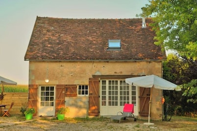 Cute cottage near a forest and ponds
