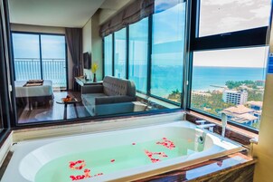 Suite Oceanview with Balcony | Bathroom | Shower, rainfall showerhead, designer toiletries, hair dryer