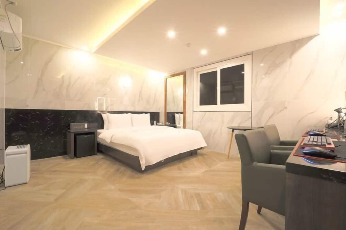 Premium bedding, down duvets, individually decorated