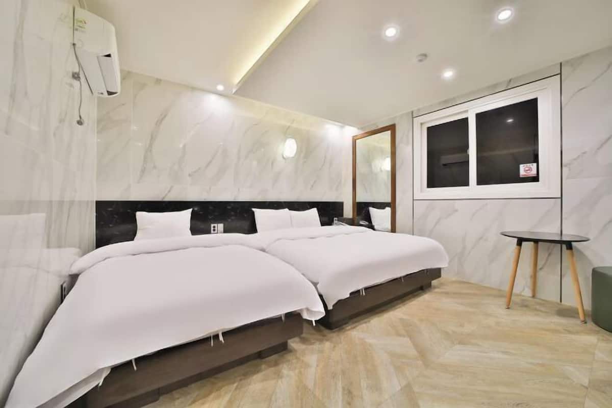 Premium bedding, down duvets, individually decorated