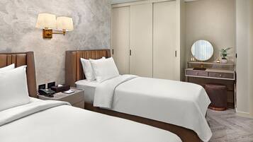 Departamento, 2 camas individuales | 1 habitación, caja de seguridad en la habitación y cortinas blackout