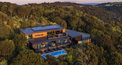 Kaitiaki Lodge - Kaitiaki Lodge is our brand new luxury lodge located in Onetangi on Waiheke Island. Situated overlooking acres of unspoilt native bush with the Hauraki Gulf beyond the setting is simply spectacular. The lodge has 5 large bedrooms, 3.