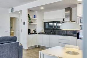 Fridge, microwave, oven, stovetop - Pet-Friendly 'Murtra Apartment' with Sea View, Shared Pool & Wi-Fi (Roses)