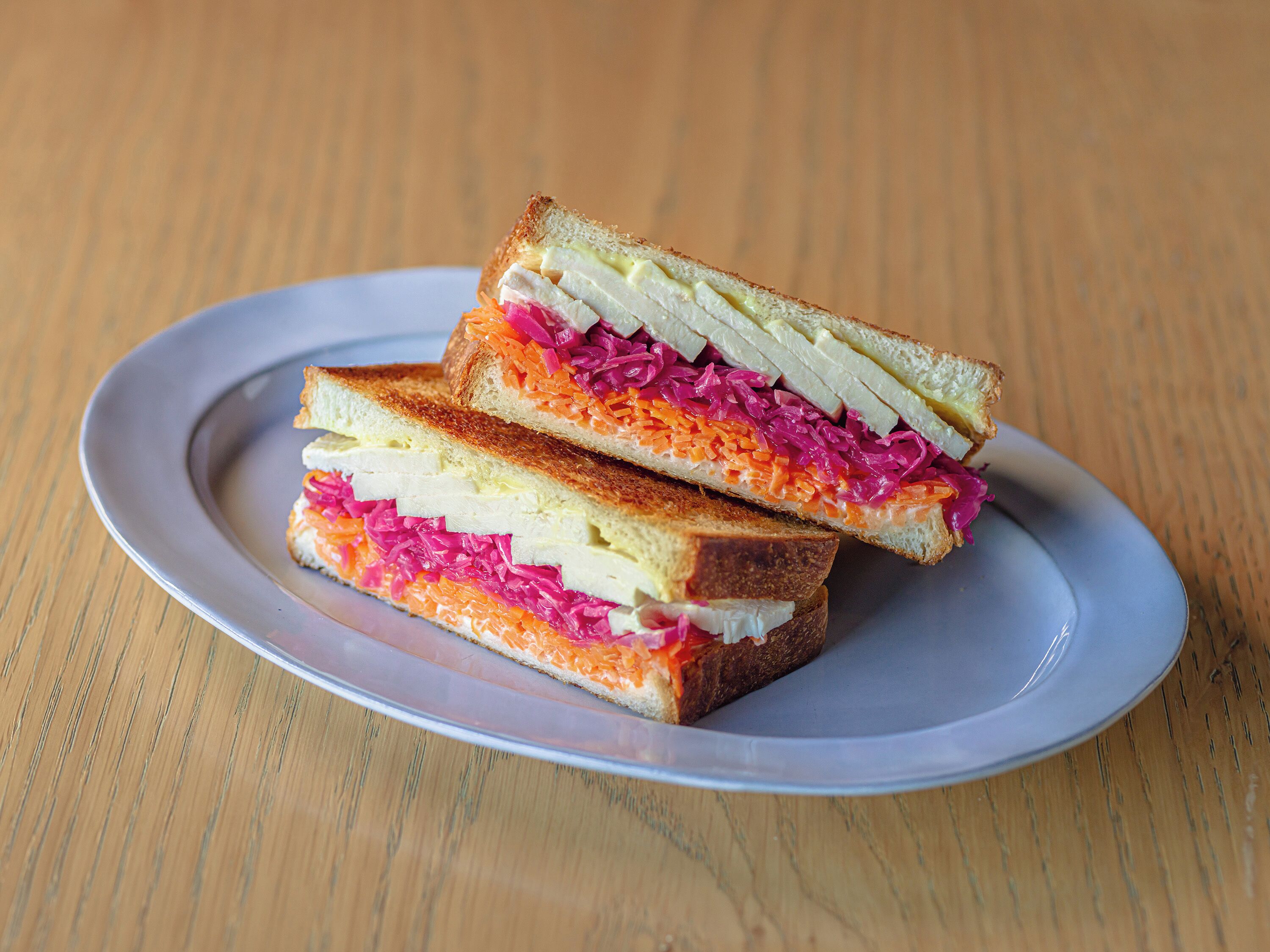 A sandwich on a plate.