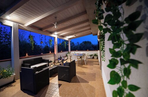 Surrounded by greenery, offers its guests a unique atmosphere.