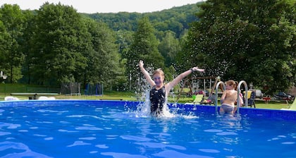 Vacation park on a south-facing slope, horses, swimming pool, restaurant and playground