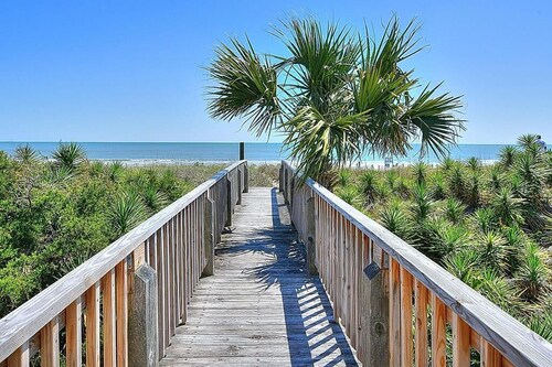 Beachfront bliss awaits at The Sandbox in Holden Beach, NC, perfect for 6.
