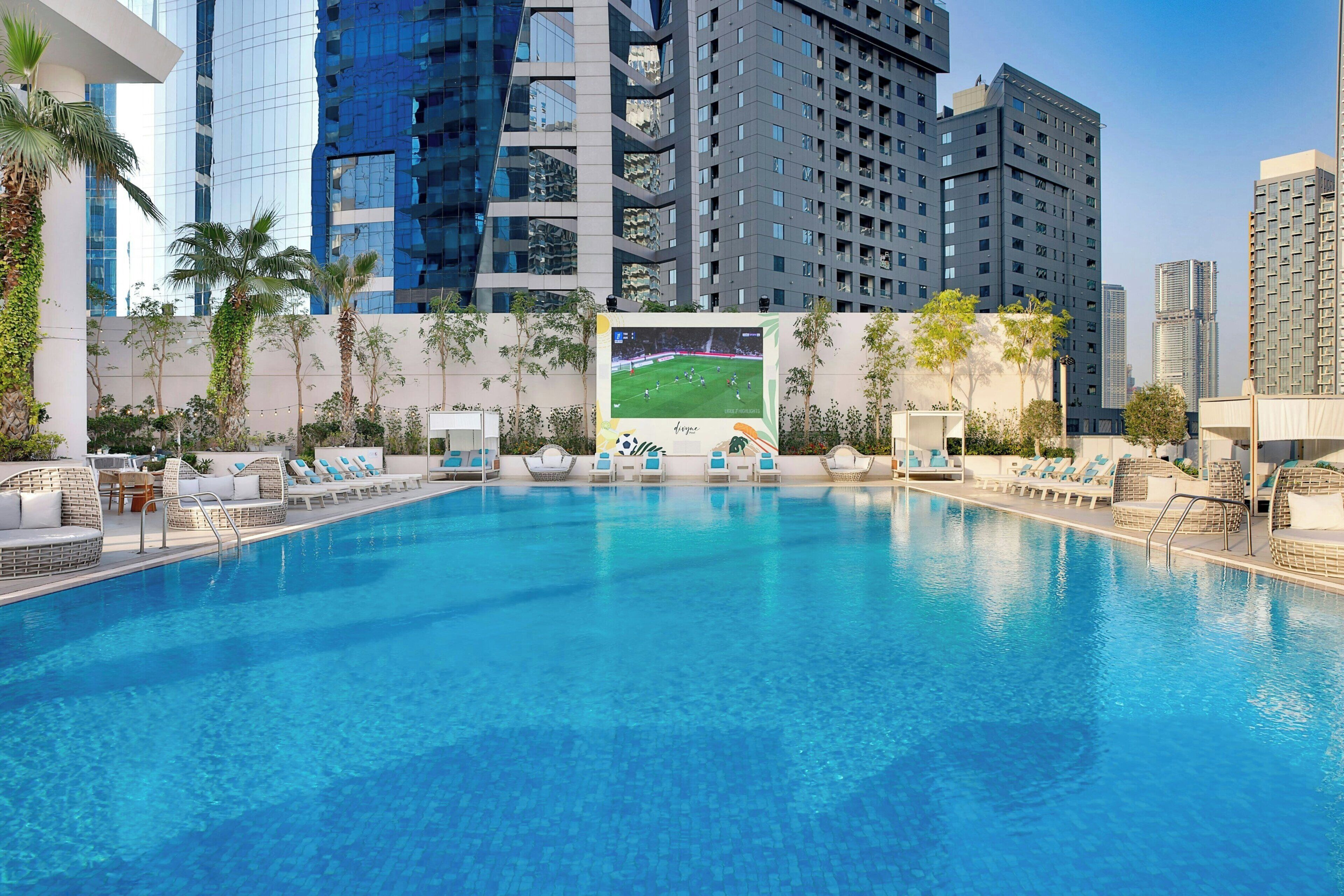 Outdoor pool, open 7:00 AM to 9:00 PM, pool loungers