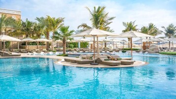 Outdoor pool, open 7:00 AM to 9:00 PM, sun loungers