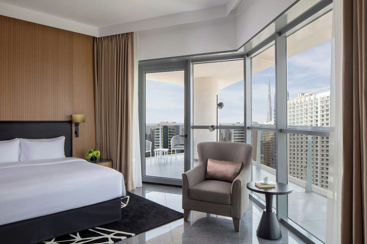 Executive Suite, 1 Bedroom, Balcony | Down duvets, in-room safe, desk, blackout curtains