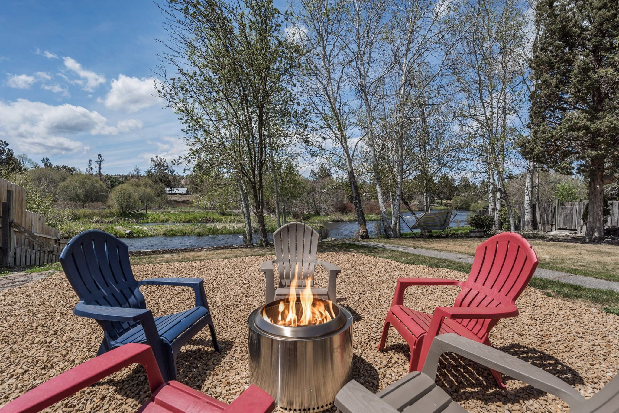 Hot Tub ~ Riverfront ~ Dog Friendly ~ Solo Stove ~ EV Charger ~ Sauna!