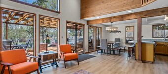 Hot Tub ~ Riverfront ~ Dog Friendly ~ Solo Stove ~ EV Charger ~ Sauna!