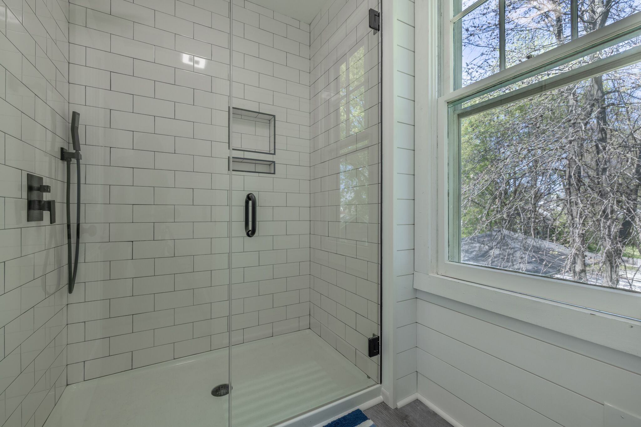 Combined shower/tub, hair dryer, towels, soap