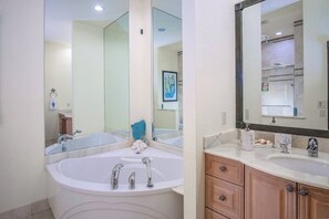 Bathtub, hair dryer, towels, soap