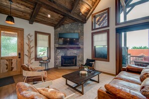 TV, fireplace - Storybook Cottage at Eagles Nest-hot tub-fireplace in Primary bedroom, Summer Concerts (Banner Elk)