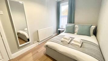 4 bedrooms, iron/ironing board, travel cot, WiFi