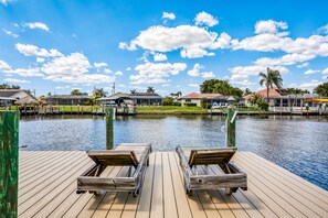 Property grounds - Magical cape home on the water with furnished deck, pool, & amazing views (Cape Coral)