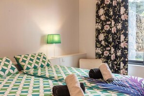 1 dormitorio, tabla de planchar con plancha, wifi gratis y ropa de cama