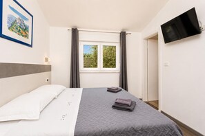 4 dormitorios, tabla de planchar con plancha, wifi y ropa de cama
