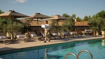 Outdoor pool, pool umbrellas, pool loungers