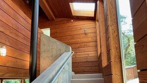 A wooden staircase with a skylight leading to an outdoor area. - Modern Retreat 15 minutes from Healdsburg Square (Healdsburg)