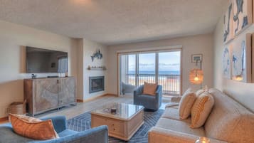 Téléviseur, foyer, lecteur de DVD, table de ping-pong