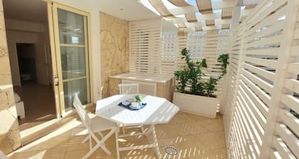 Modern double bedroom with private bathroom and patio