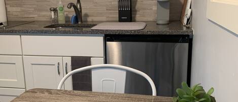 Fridge, microwave, coffee/tea maker, toaster