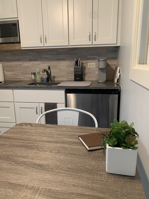 Fridge, microwave, coffee/tea maker, toaster