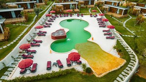 A resort with multiple modern villas, a central swimming pool, and sun loungers. - Mossa Afkule (Fethiye)