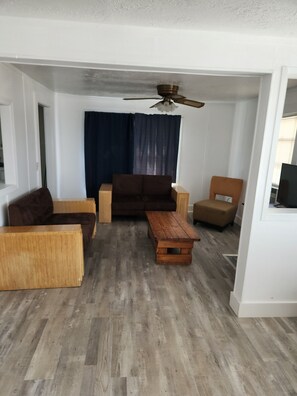 Standard Apartment | Living area | 37-inch flat-screen TV with cable channels, TV - 7 Beachside Inn (Hampton)