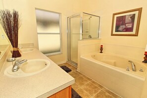 Bathtub, hair dryer, towels