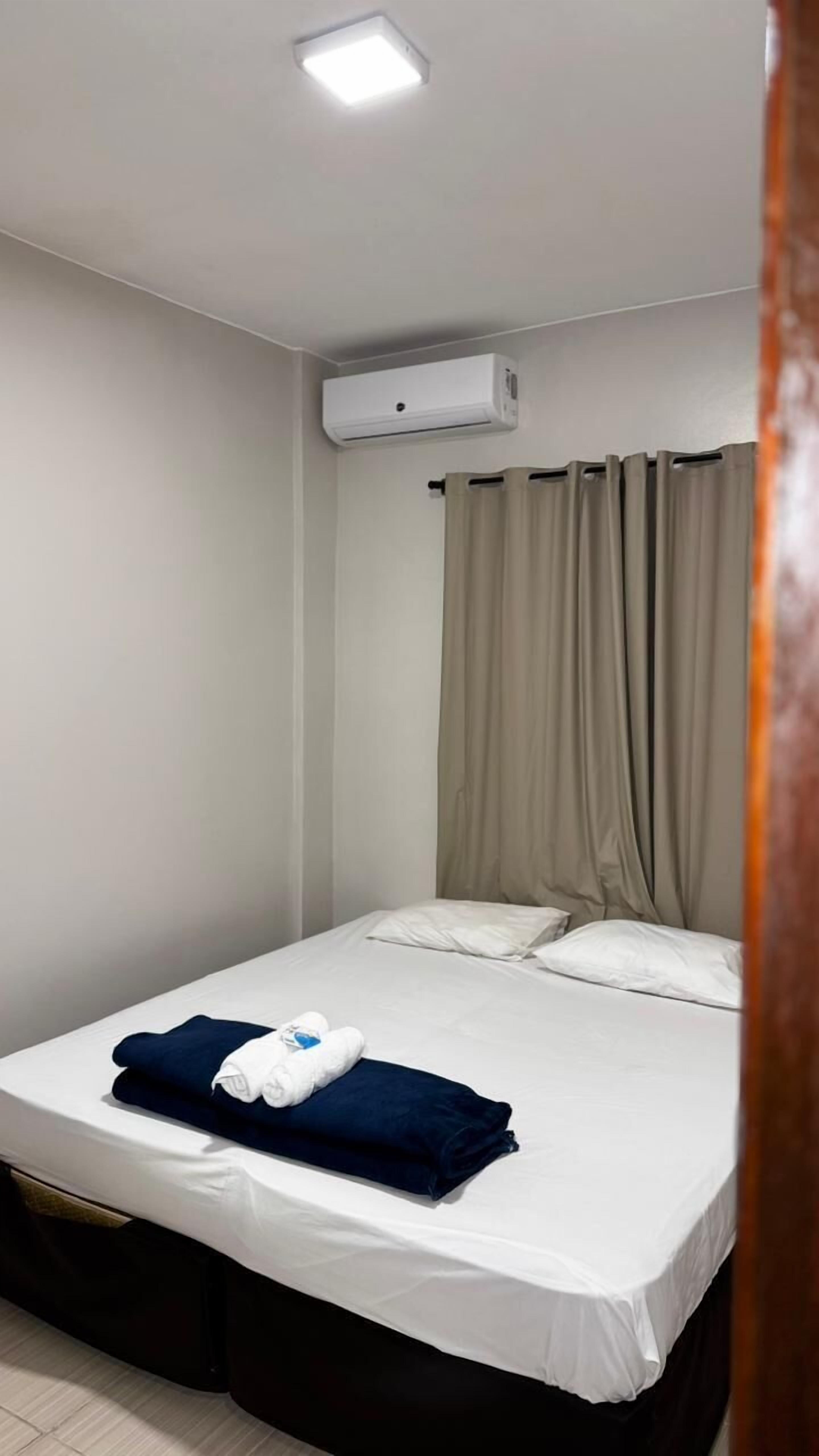 Habitación económica, 3 habitaciones, baño compartido, vistas a la ciudad | Ropa de cama de alta calidad, colchones Select Comfort, minibar