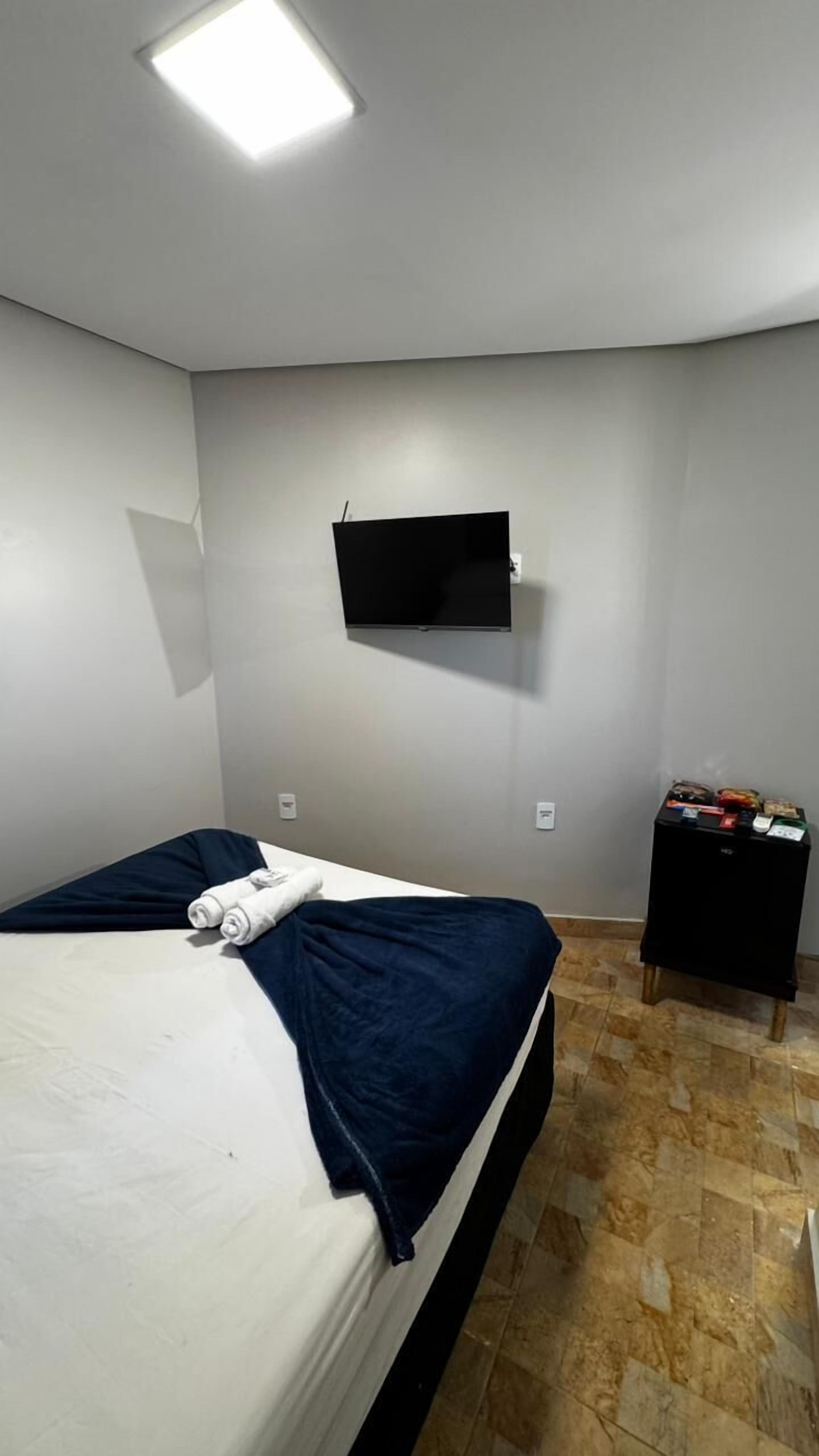 Quarto econômico, 1 quarto, ar-condicionado, vista para a cidade | Roupas de cama premium, camas Select Comfort, frigobar