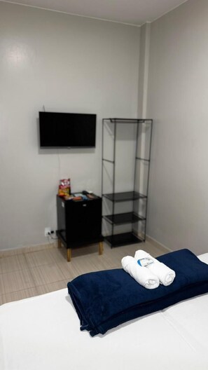 Economy Room, 3 Bedrooms, Shared Bathroom, City View | Premium bedding, Select Comfort beds, minibar, individually decorated