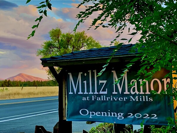 A sign for 'Millz Manor at Fallriver Mills' with an opening date of 2022. - Millz Manor at Fall River Millz (Fall River Mills)
